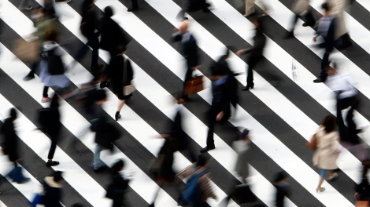 People cross a street in Tokyo People cross a street in Tokyo March 18, 2015
